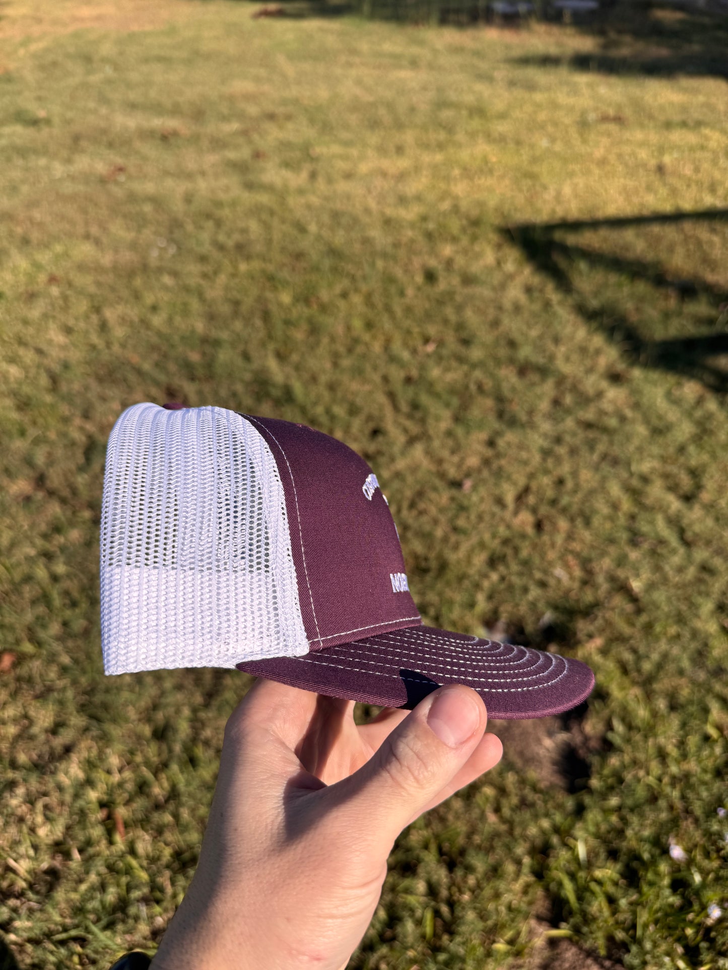 Maroon trucker